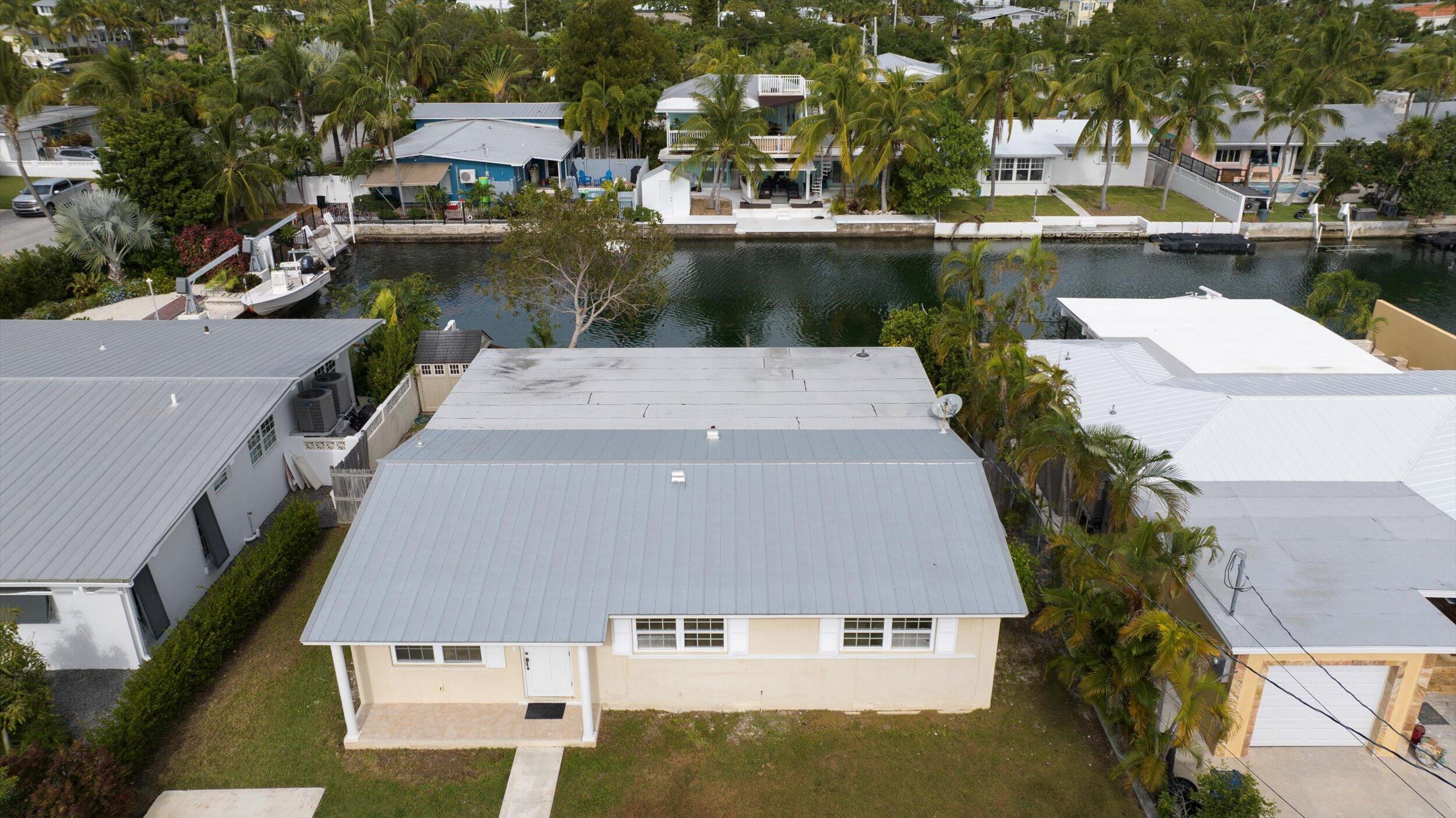 74 Key Haven Road Key West, FL 33040 - Photo 21 of 28 aerial view of a house with a lake view
