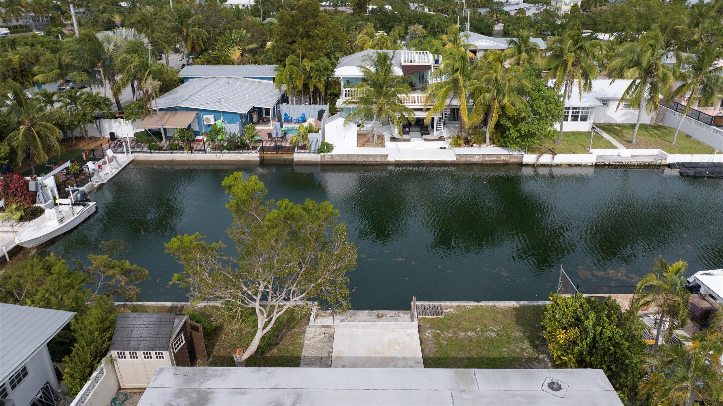 74 Key Haven Road Key West, FL 33040 - Photo 22 of 28 an aerial view of a house with a lake view