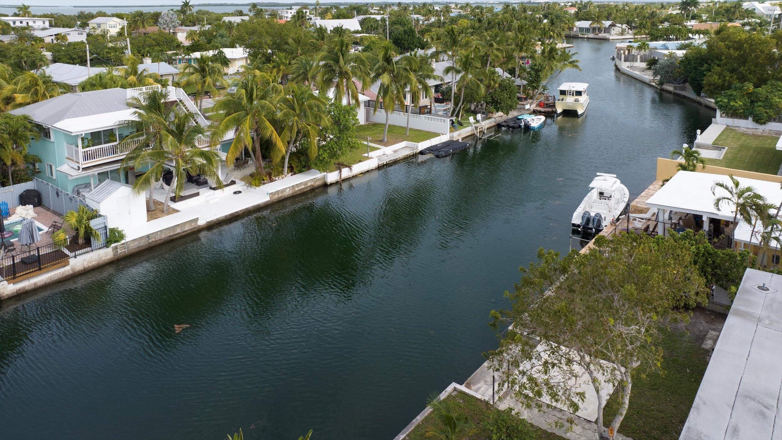 74 Key Haven Road Key West, FL 33040 - Photo 27 of 28 an aerial view of a house with a lake view