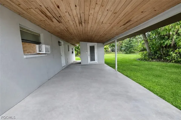 a view of a porch in front of a house