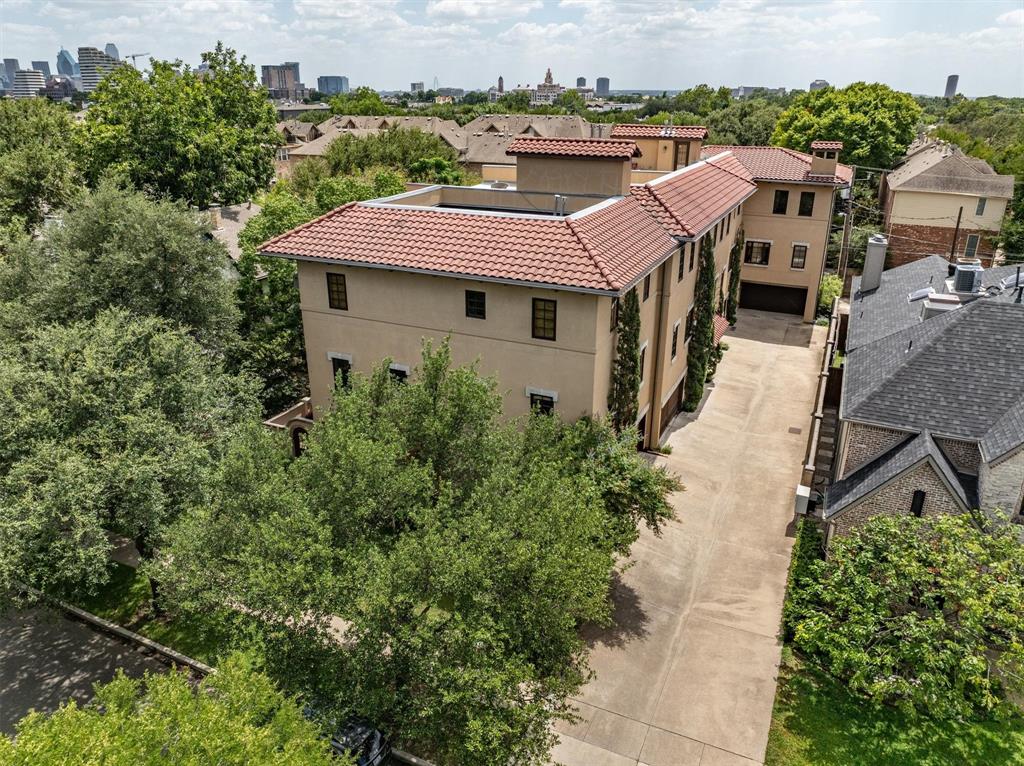 4323 Gilbert Avenue, Unit 4 Dallas, TX 75219 - Photo 35 of 40 a aerial view of a house with a yard and balcony