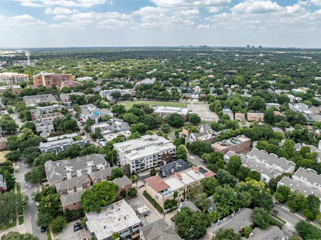 4323 Gilbert Avenue, Unit 4 Dallas, TX 75219 - Photo 39 of 40 an aerial view of residential houses with city view
