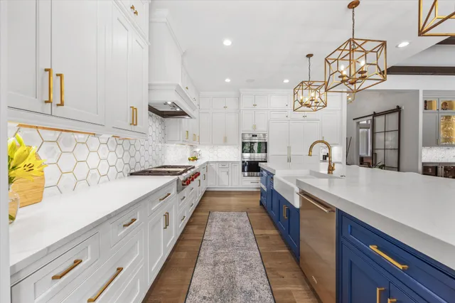 a bathroom with a sink a mirror a toilet and shower