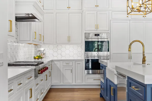 a bedroom with a bed window and table chair