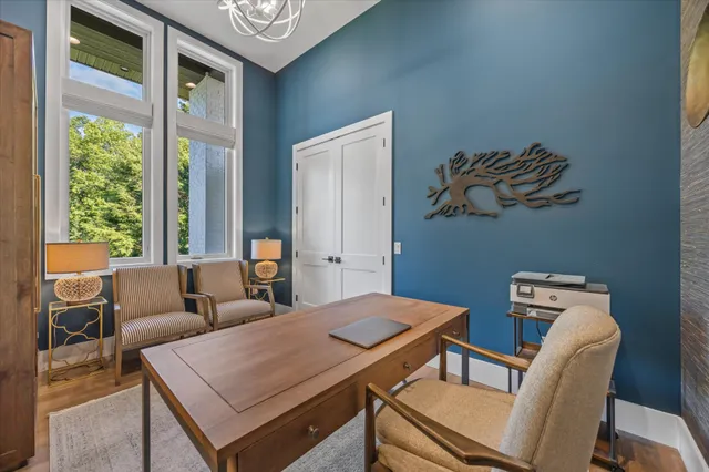 a view of swimming pool with seating space