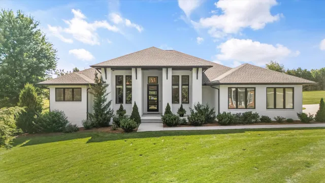 a living room with furniture fireplace and flat screen tv