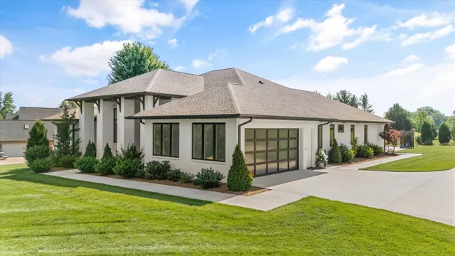 a living room with furniture fireplace and flat screen tv