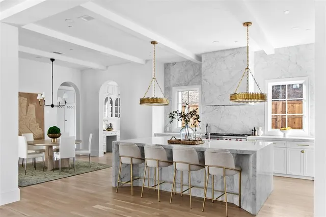 a bathroom with a sink a vanity and a mirror