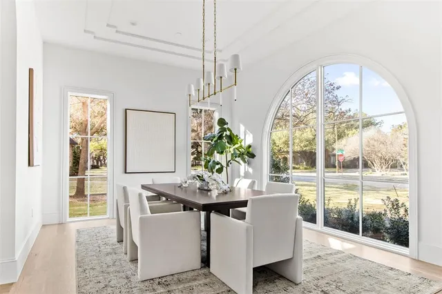 a bathroom with a granite countertop sink double vanity and window
