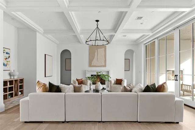 a bathroom with a sink mirror and a shower
