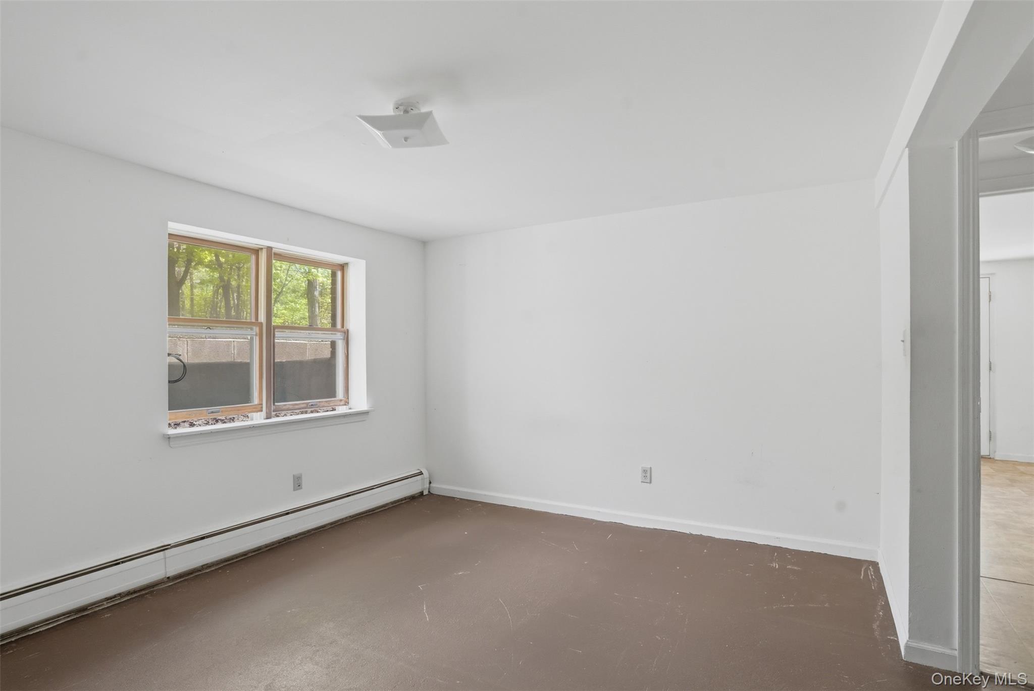 6 Short Road Wurtsboro, NY 12790 - Photo 42 of 48 an empty room with a window