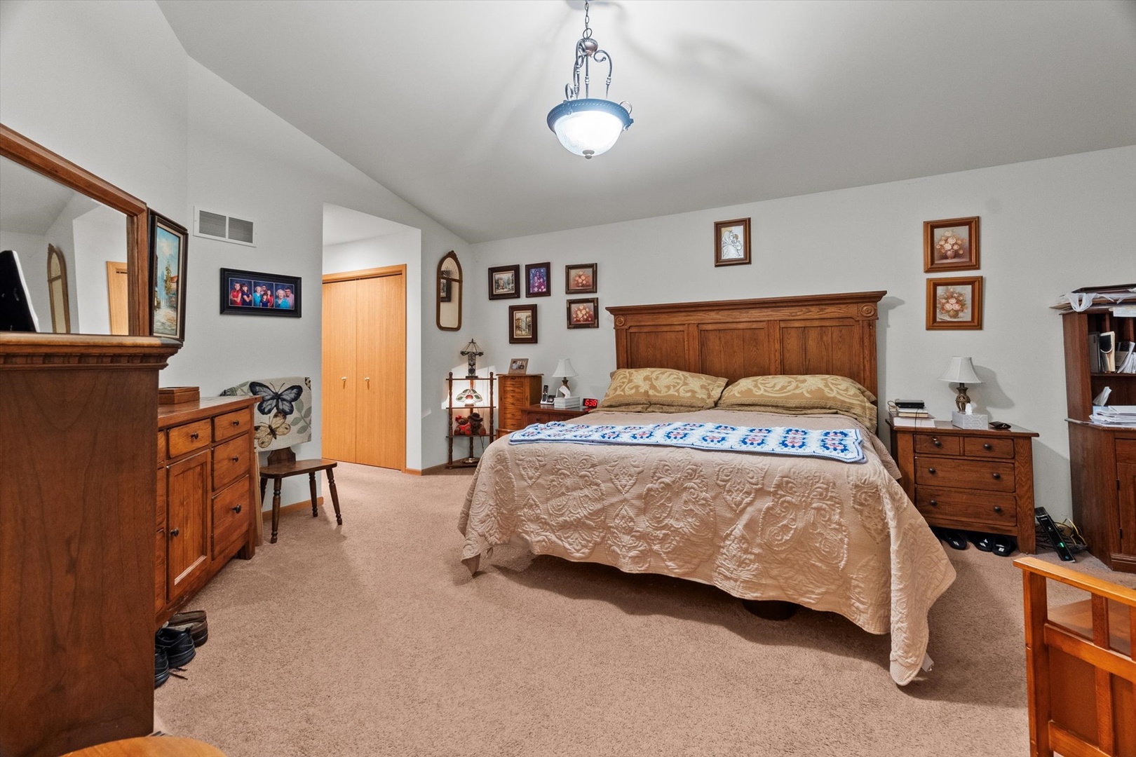 25426 Barrow Road Manhattan, IL 60442 - Photo 13 of 30 a bedroom with a bed and wooden floor