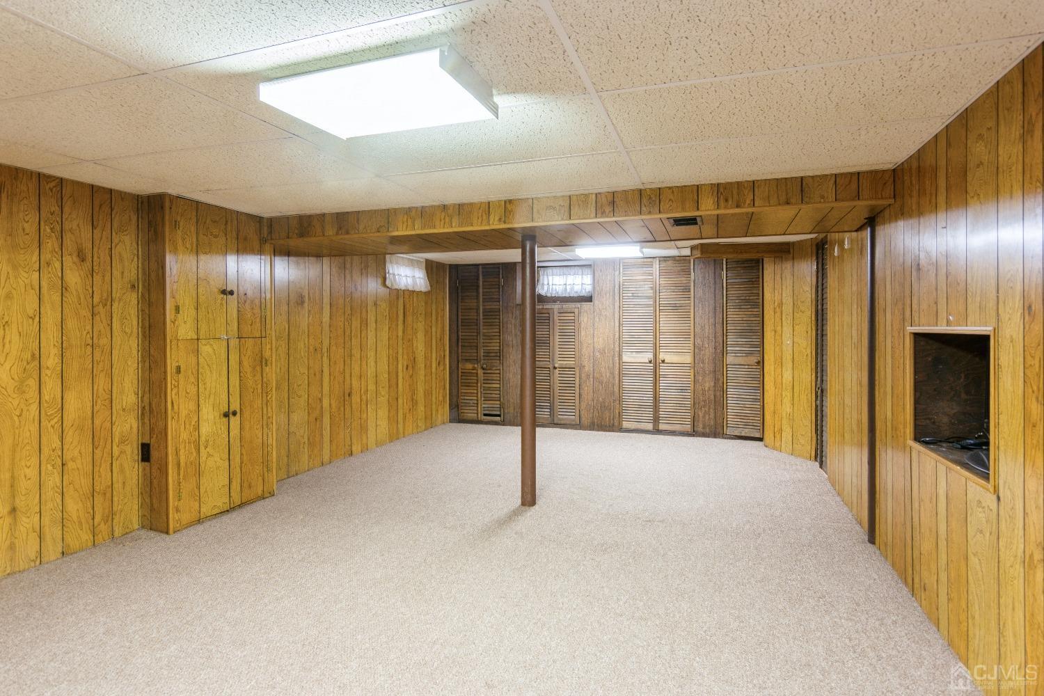 168 Dunhams Corner Road East Brunswick, NJ 08816 - Photo 26 of 30 Versatile finished basement - great space to entertain!