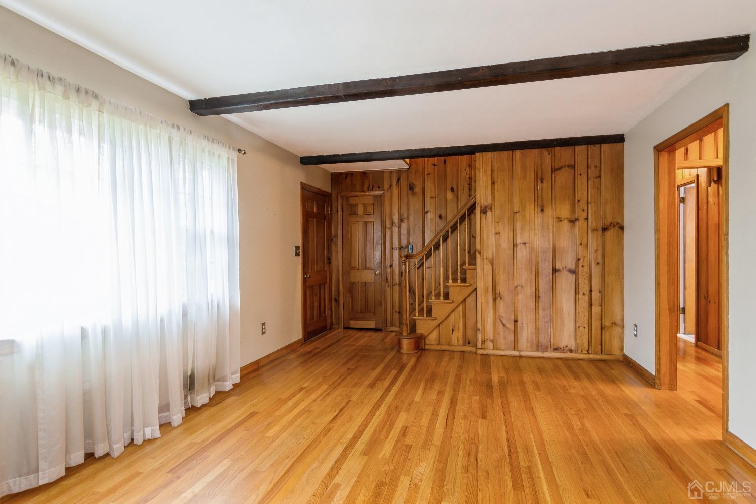 168 Dunhams Corner Road East Brunswick, NJ 08816 - Photo 6 of 30 Newly polished and gleaming hardwood floors on all of the main level! (Floors are now a lighter color as they have been freshly polished)