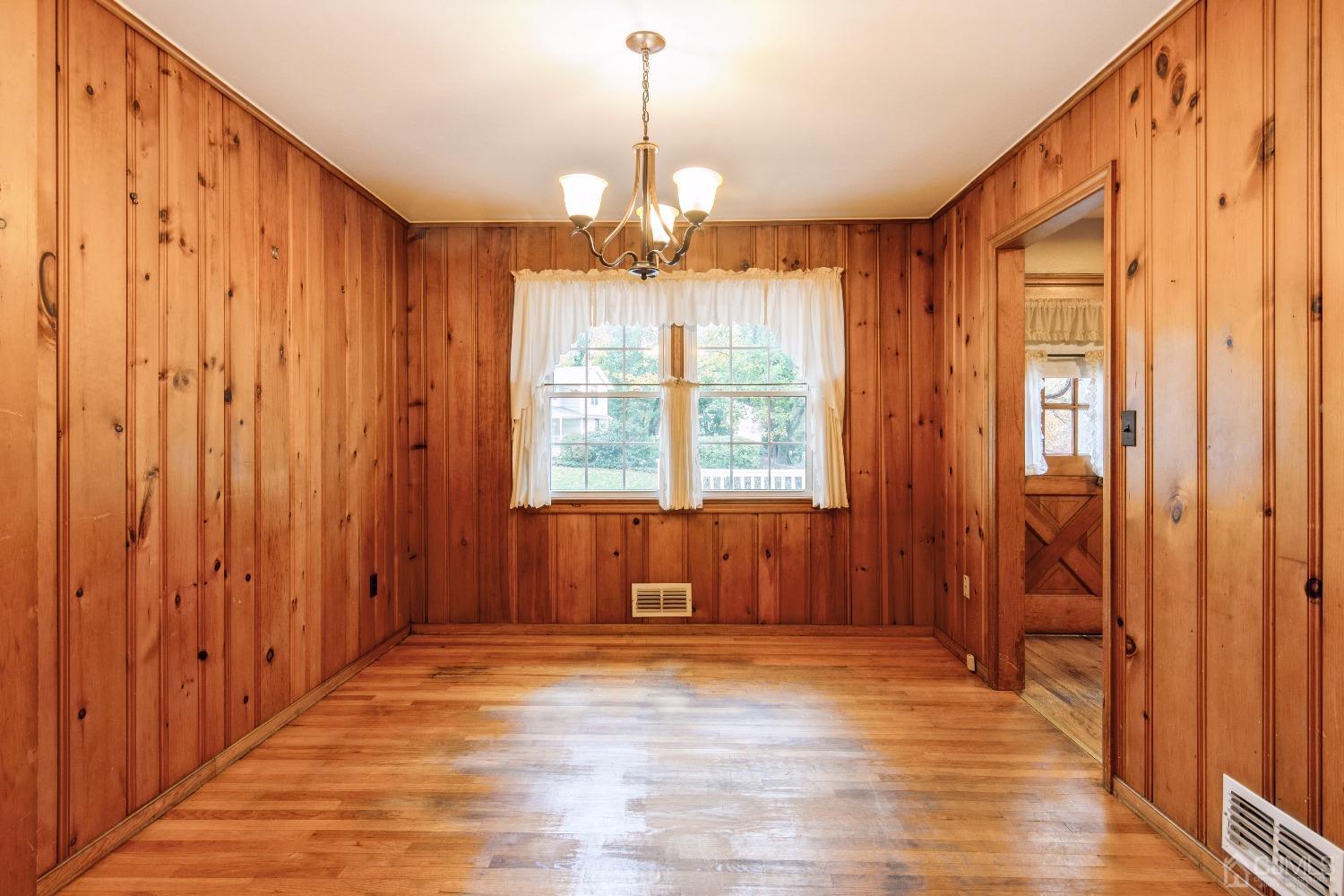 168 Dunhams Corner Road East Brunswick, NJ 08816 - Photo 9 of 30 Enjoy your thanksgiving meal with friends and family in this warm and inviting dining room!(Floors are now a lighter color as they have been freshly polished)