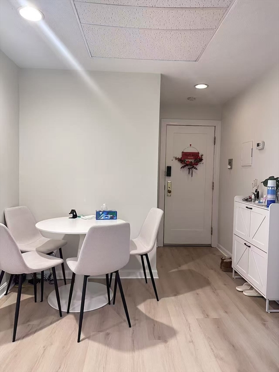 1423 Commonwealth Avenue, Unit 202 Boston, MA 02135 - Photo 2 of 6 a view of a dining room with furniture