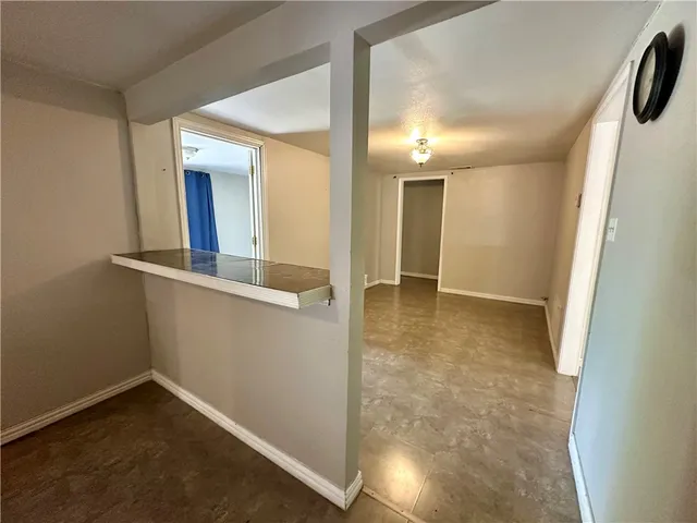 an entryway of a house with hallway