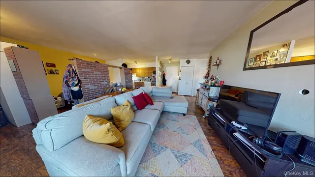 a living room with furniture fireplace and a flat screen tv