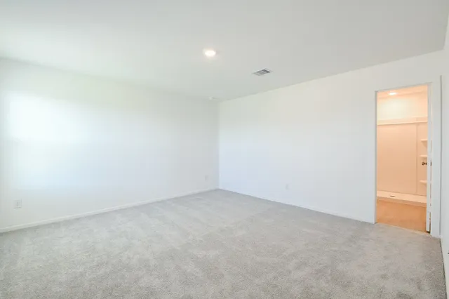 an empty room with a natural light