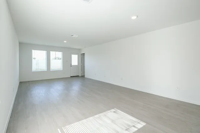 an empty room with windows