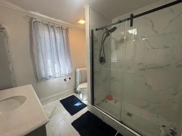 a room with furniture and a wooden floor