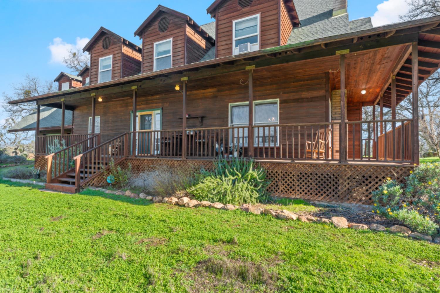 8251 Buffalo Ridge Road Ione, CA 95640 - Photo 12 of 75 front view of a house with a yard