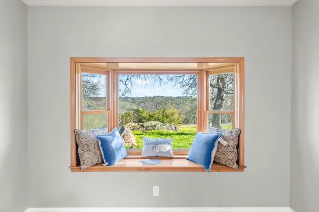 a en suite bathroom with double sink and a mirror