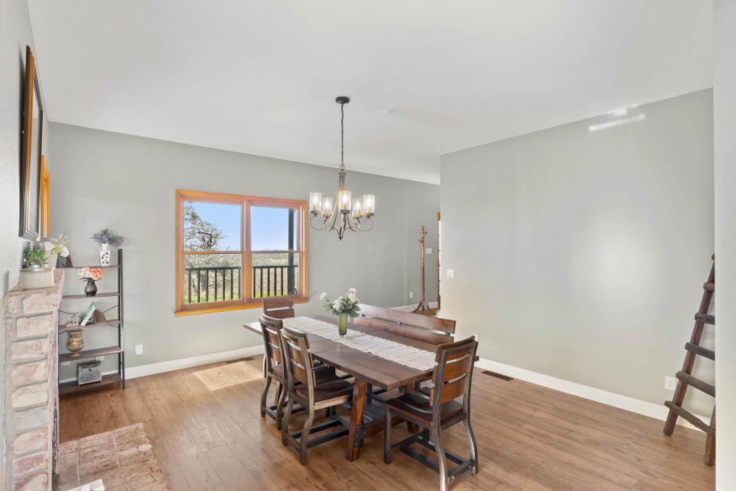 8251 Buffalo Ridge Road Ione, CA 95640 - Photo 31 of 75 a view of a dining room with furniture and window