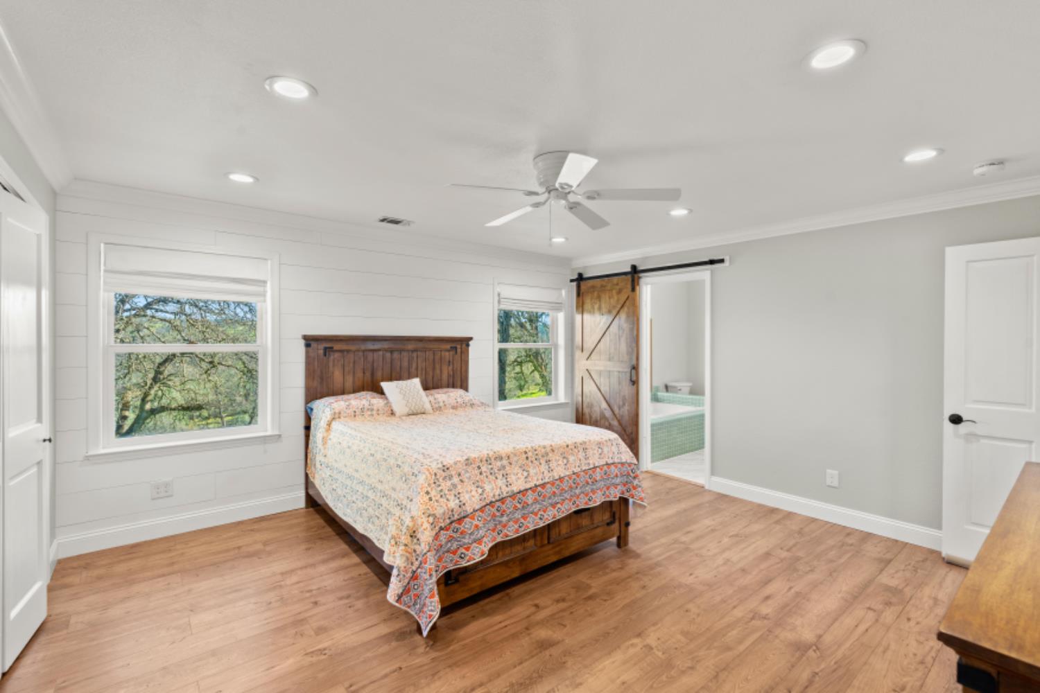 8251 Buffalo Ridge Road Ione, CA 95640 - Photo 38 of 75 a bed sitting in a spacious bedroom next to a window