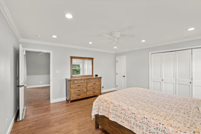 a view of a city with lush green forest