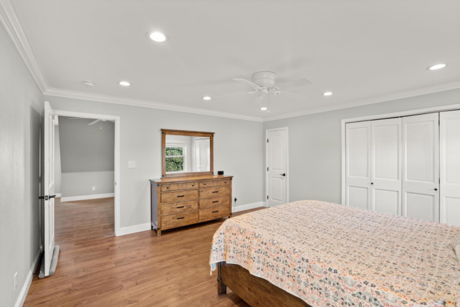 8251 Buffalo Ridge Road Ione, CA 95640 - Photo 39 of 75 a bedroom with a bed and a dresser