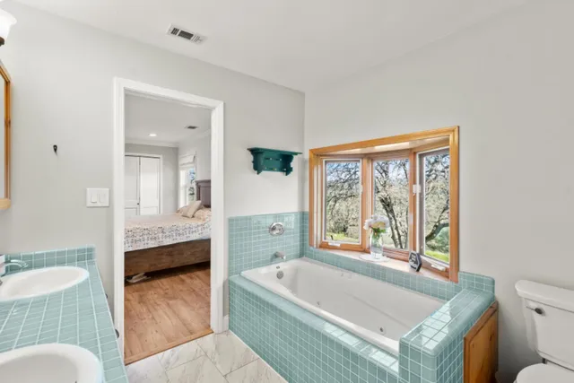 a backyard of a house with lots of green space