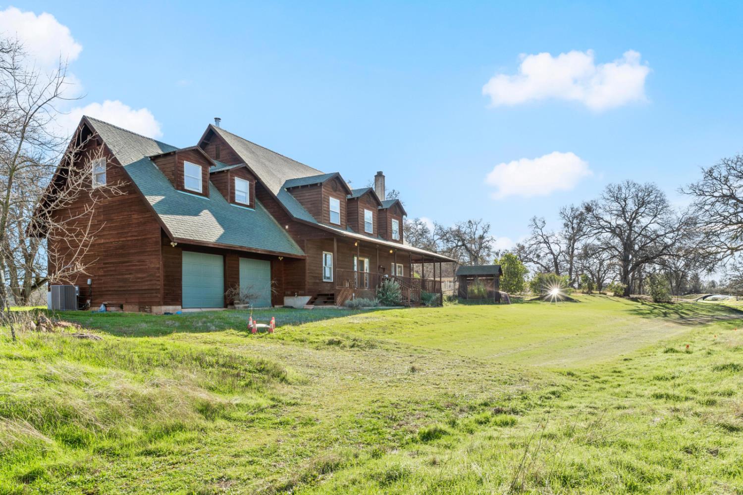 8251 Buffalo Ridge Road Ione, CA 95640 - Photo 10 of 75 a house view with a garden space