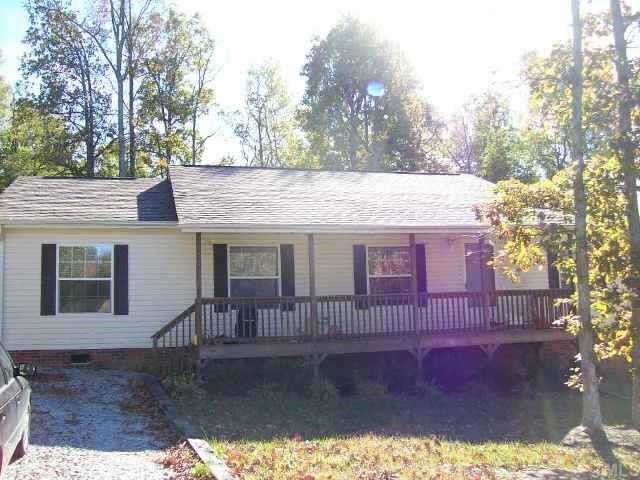 129 Azalea Drive Roxboro, NC 27573 - Photo 1 of 1 a view of a house with a yard