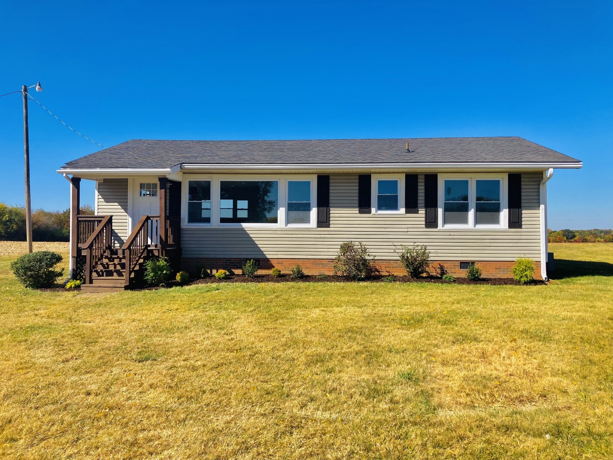 577 Corinth Road Portland, TN 37148 - Photo 1 of 30 a front view of a house with yard