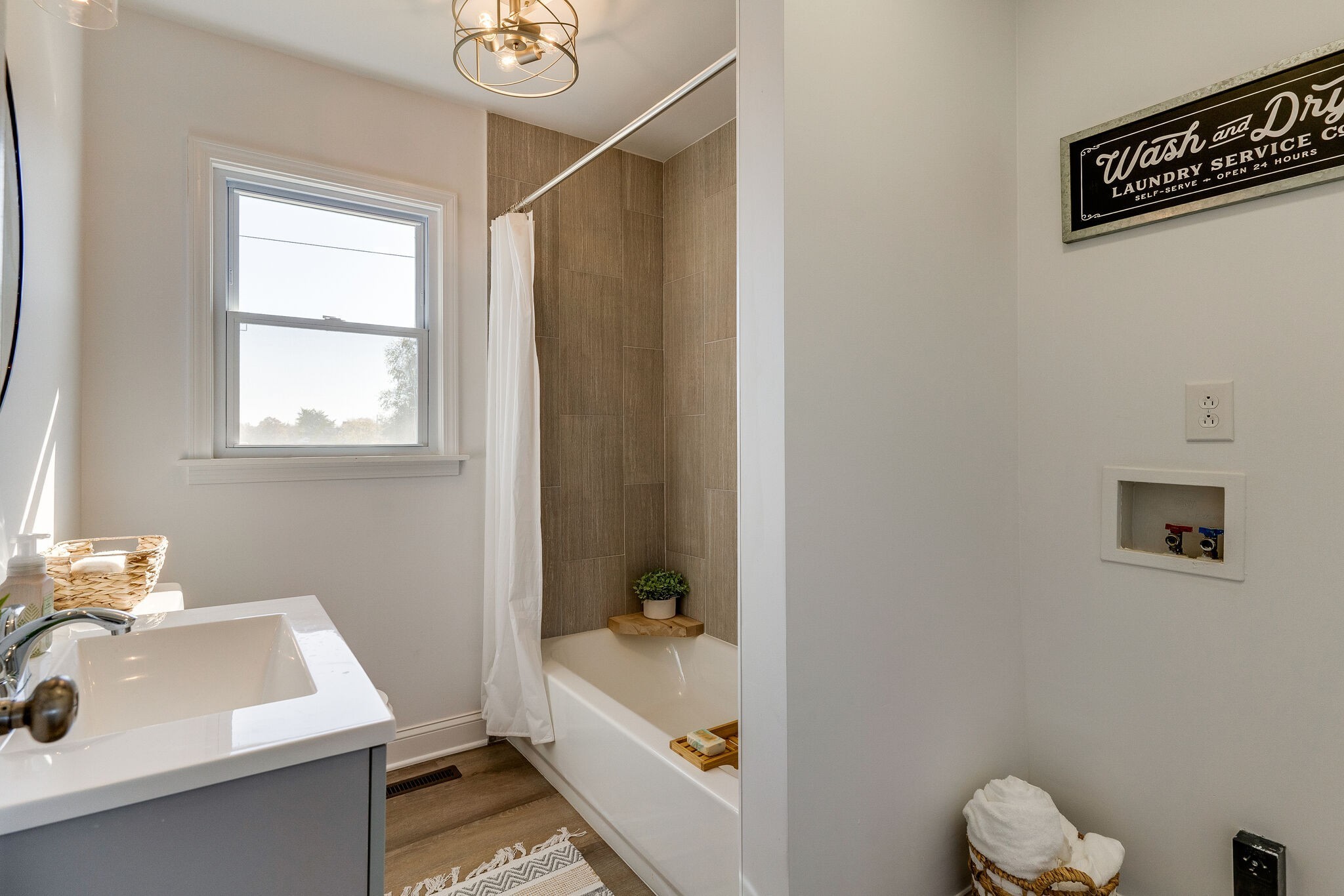 577 Corinth Road Portland, TN 37148 - Photo 15 of 30 a bathroom with a sink and a bathtub