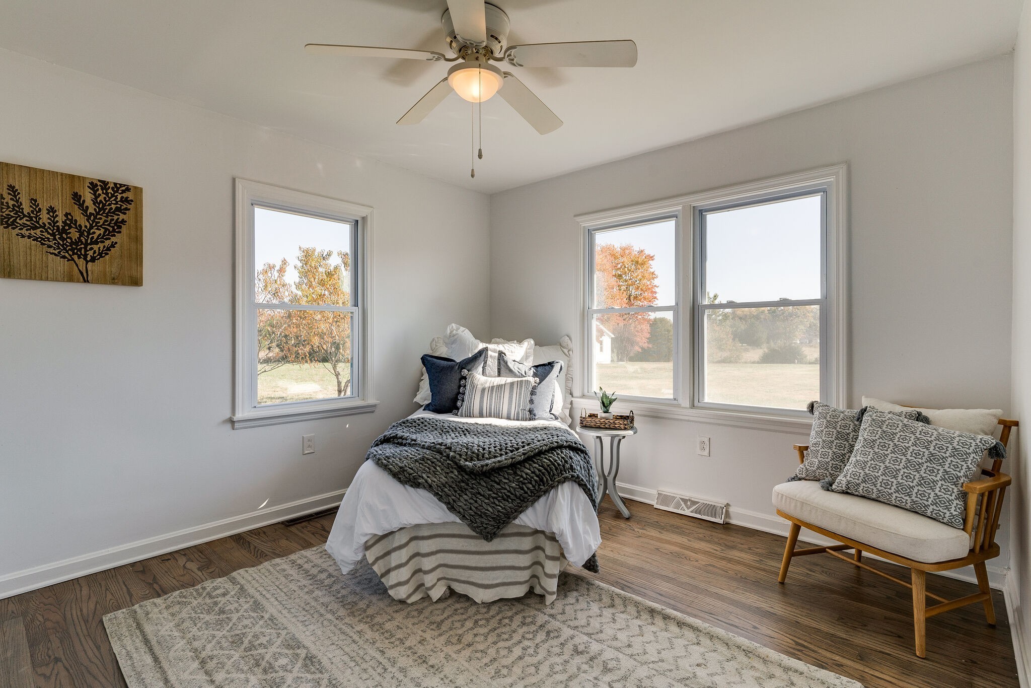 577 Corinth Road Portland, TN 37148 - Photo 17 of 30 a bedroom with a bed and wooden floor