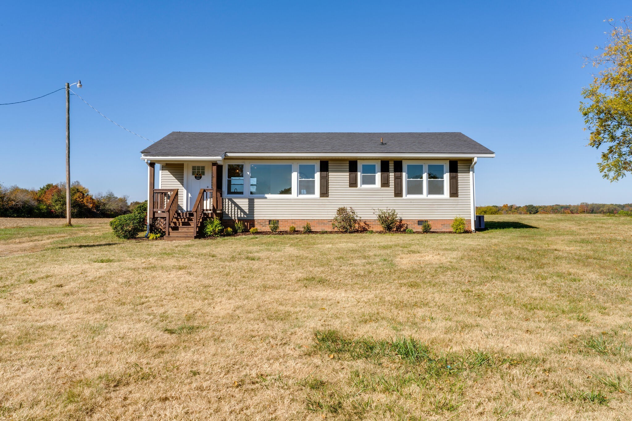 577 Corinth Road Portland, TN 37148 - Photo 27 of 30 a front view of a house with garden