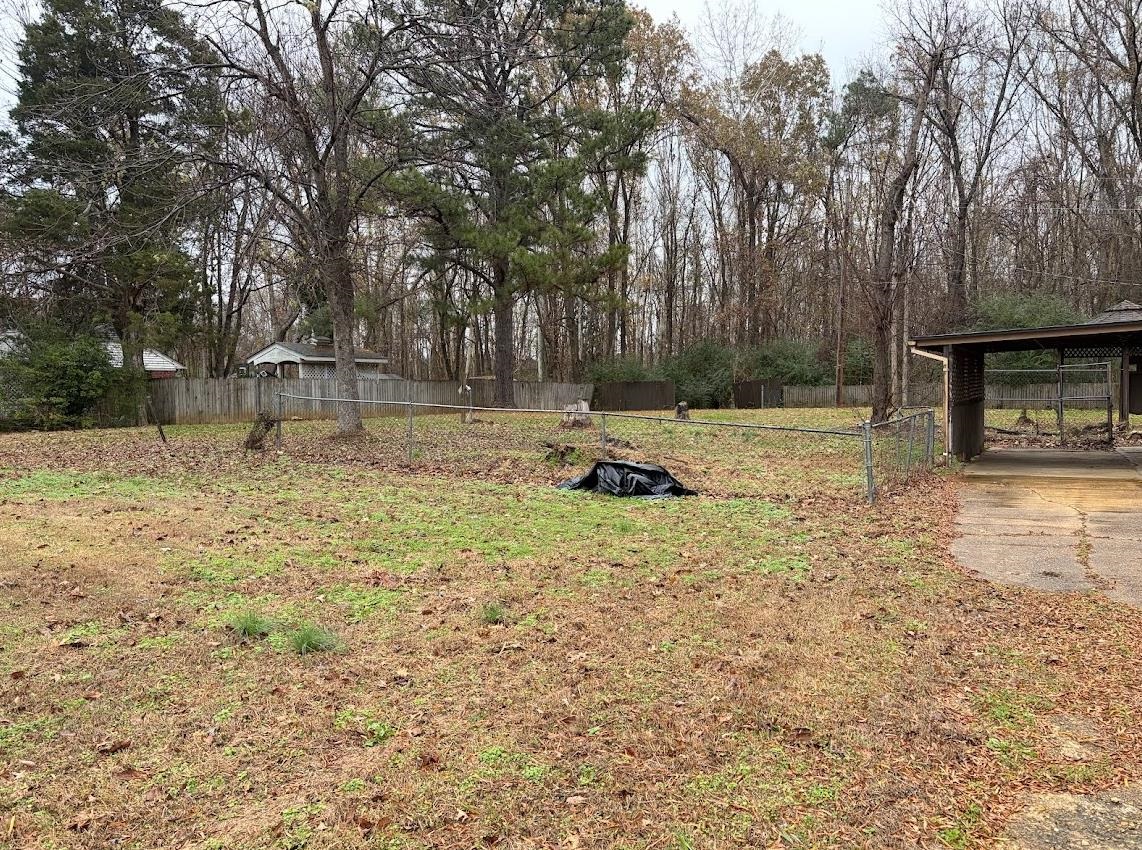 7638 Marvin Road Millington, TN 38053 - Photo 15 of 25 a backyard of a house with trees and outdoor