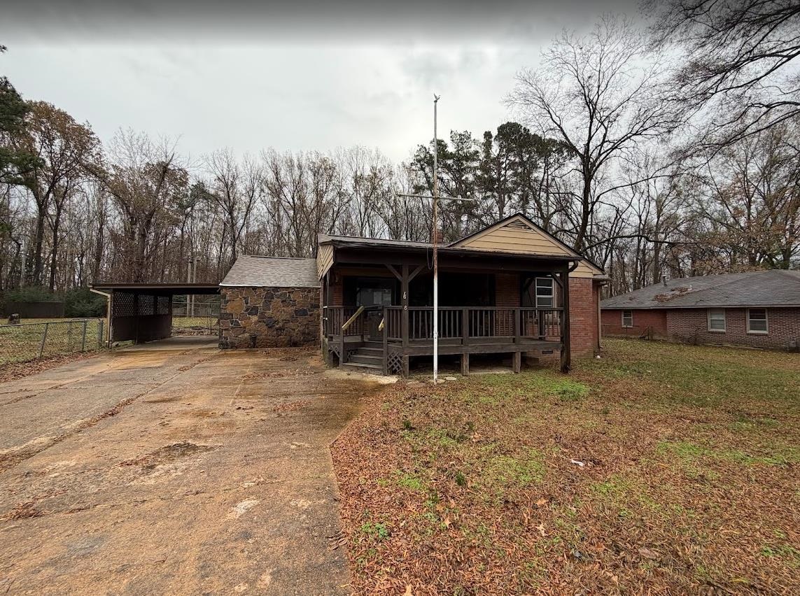 7638 Marvin Road Millington, TN 38053 - Photo 18 of 25 a front view of a house with a yard