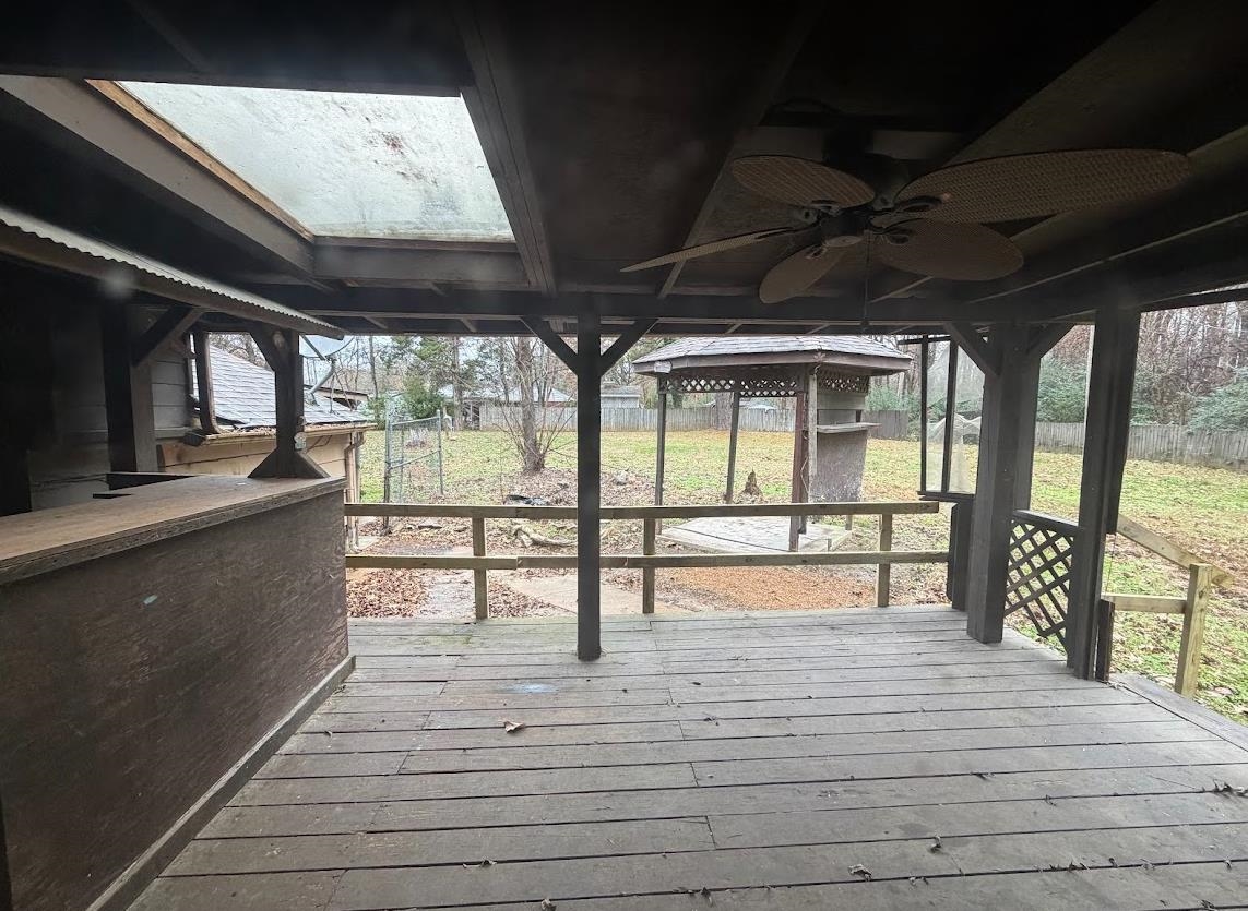 7638 Marvin Road Millington, TN 38053 - Photo 21 of 25 a view of empty room with wooden floor and fan