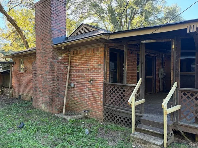 a front view of a house with staircase