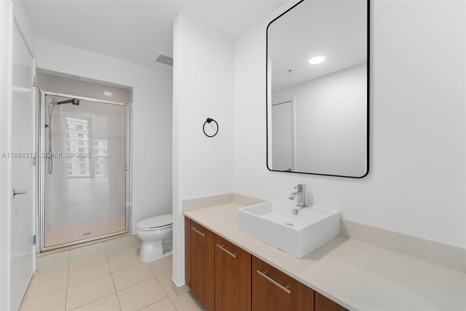 3301 Northeast 1st Avenue, Unit H1510 Miami, FL 33137 - Photo 11 of 23 a bathroom with a sink toilet and shower