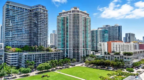 a view of a city with tall buildings
