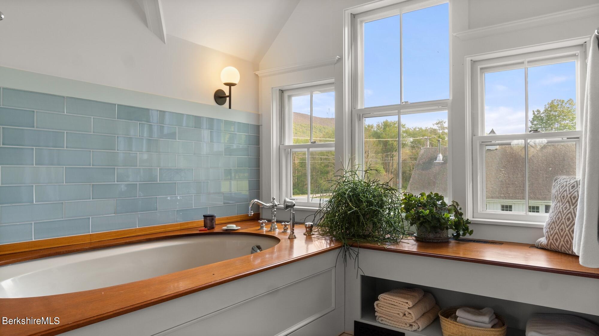 2325 Hancock Road Hancock, MA 01267 - Photo 28 of 61 a bath room with a large window and potted plant