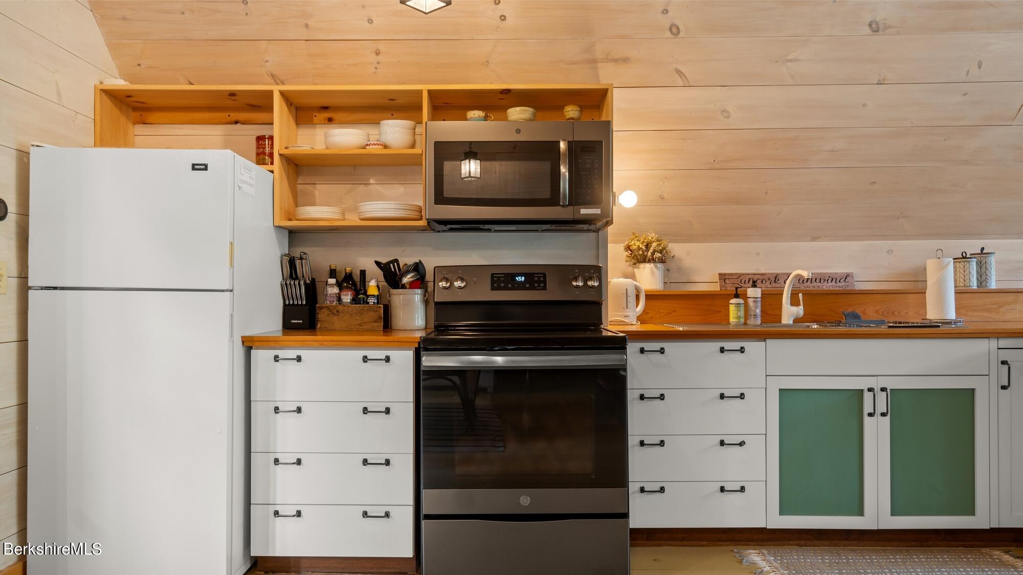 2325 Hancock Road Hancock, MA 01267 - Photo 50 of 61 a kitchen with a refrigerator and a stove