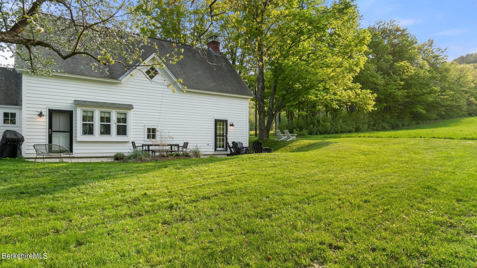 2325 Hancock Road Hancock, MA 01267 - Photo 56 of 61 a backyard of a house with seating space