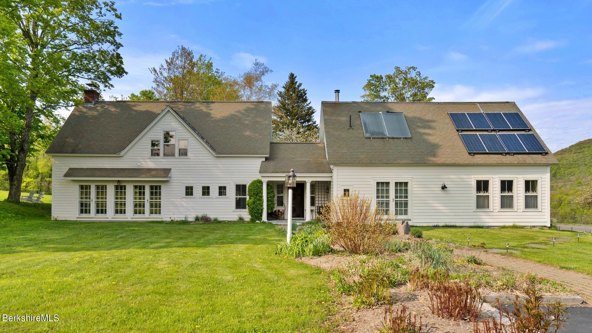 2325 Hancock Road Hancock, MA 01267 - Photo 6 of 61 front view of house with a yard
