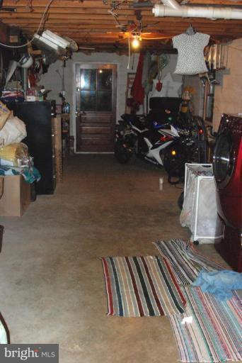16204 Spade Road Hagerstown, MD 21740 - Photo 13 of 13 a view of a room with gym equipment