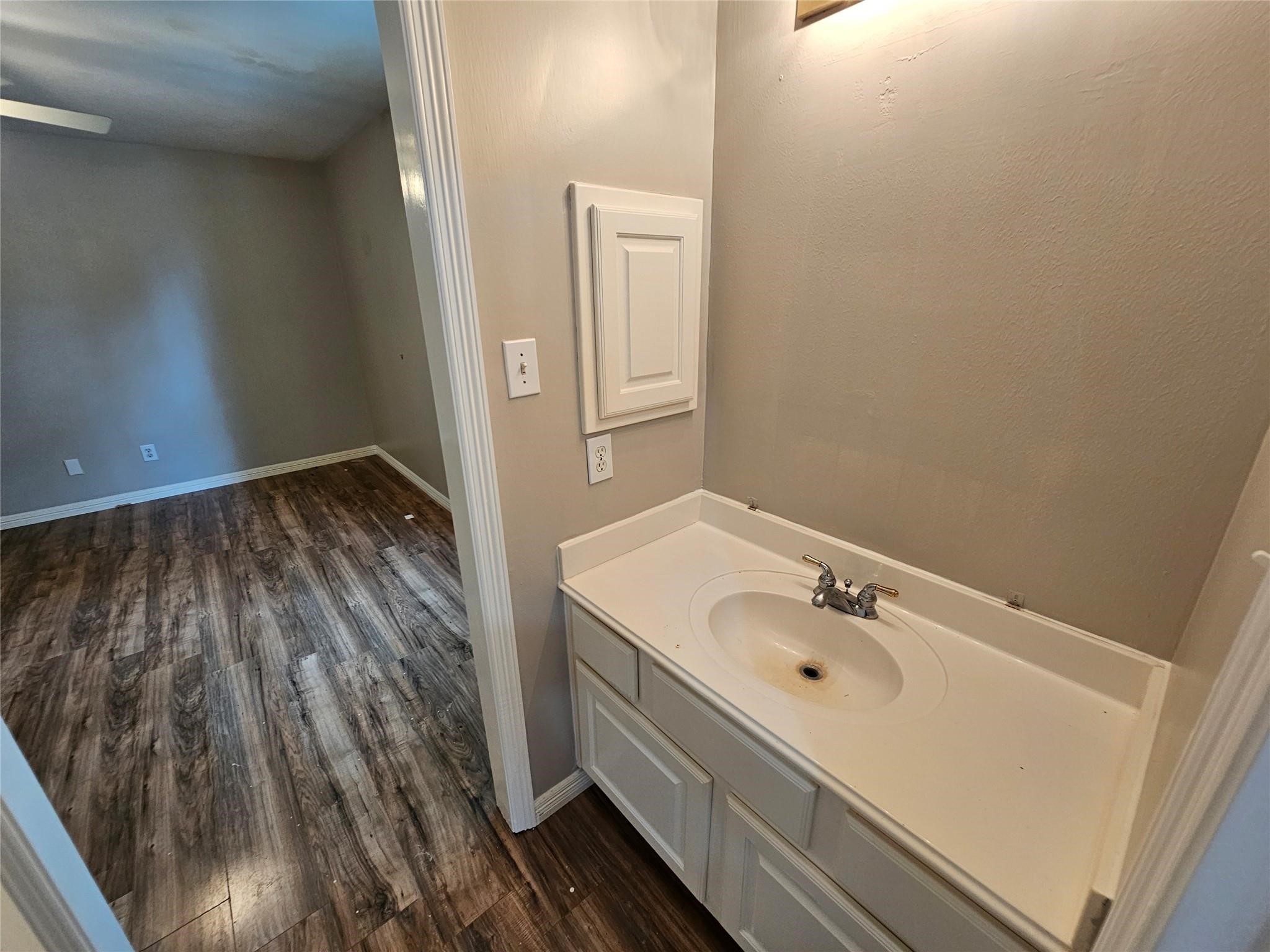 25606 Valley Springs Place Spring, TX 77373 - Photo 24 of 31 a bathroom with a sink and a mirror